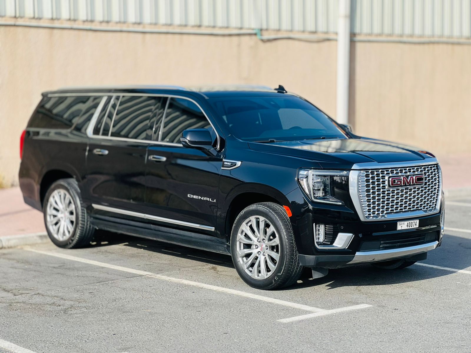 Hire 2022 GMC Yukon XL Denali Black in Dubai rental in Sheikh Zayed Road, Dubai