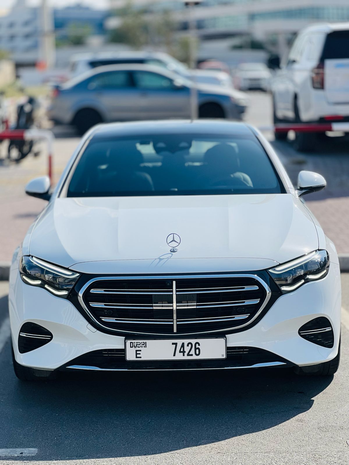 Rent a 2024 Mercedes-Benz E300 White in Dubai photo 2