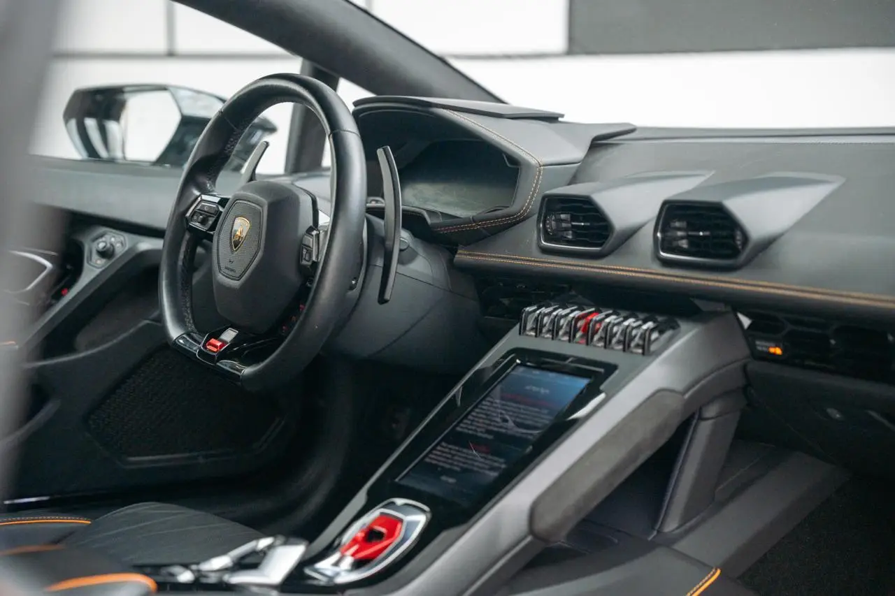 Rent a 2023 Lamborghini Huracan EVO Black in Dubai photo 3