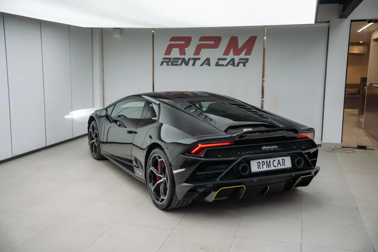 Rent a 2023 Lamborghini Huracan EVO Black in Dubai photo 5