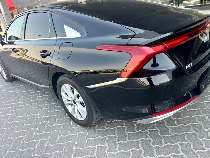Rent a 2024 Kia K8 Black in Dubai photo 2