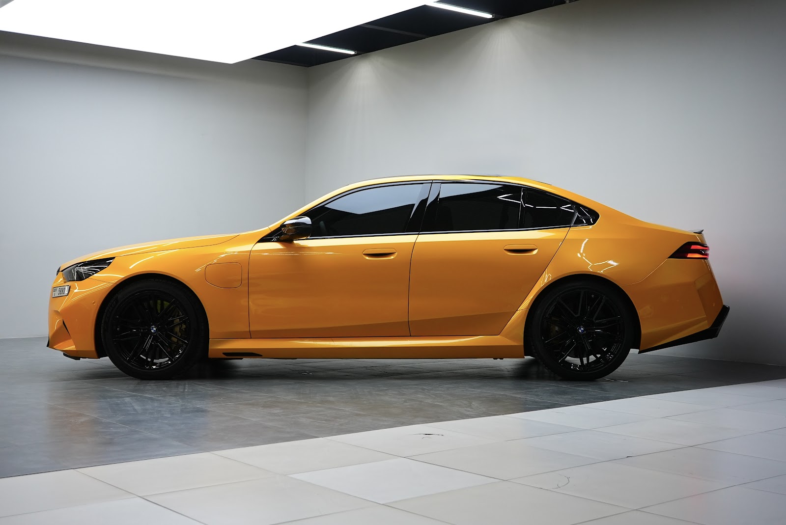 Rent BMW M5 G90 in Dubai (Yellow) photo 14