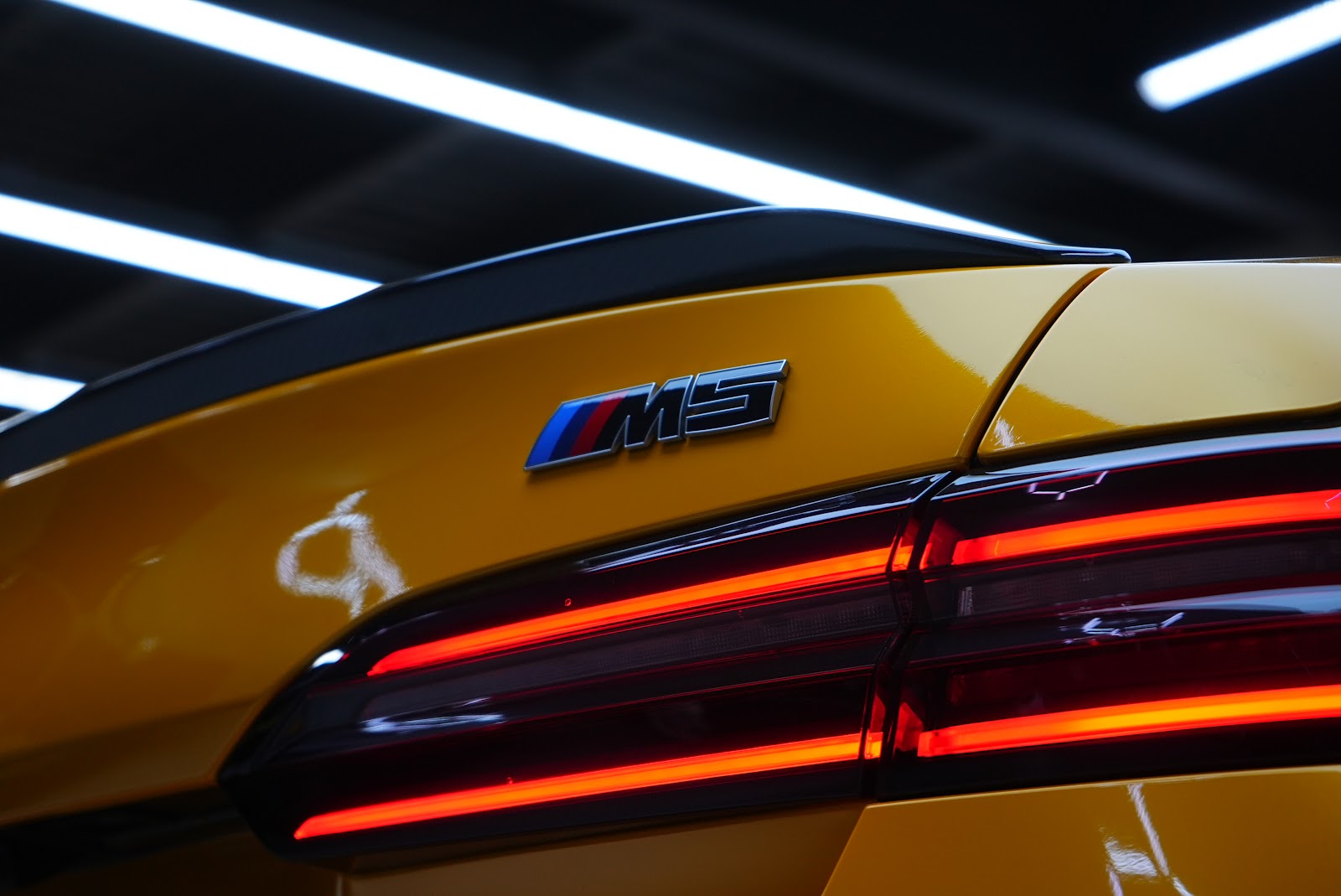Rent BMW M5 G90 in Dubai (Yellow) photo 4