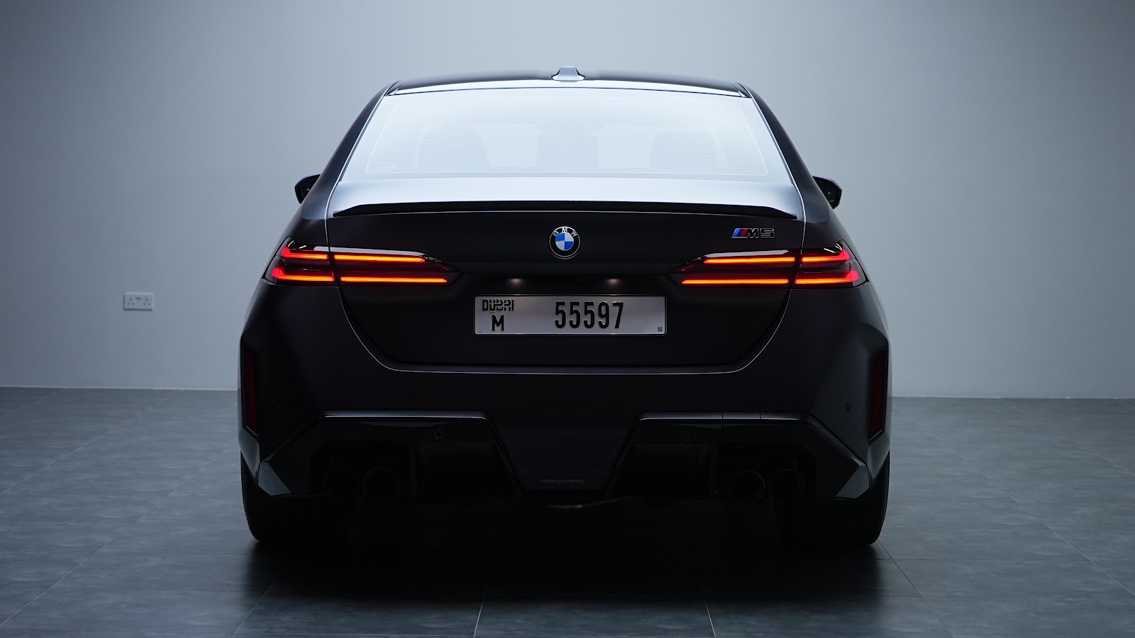 Rent BMW M5 G90 in Dubai (Black Matte) photo 2