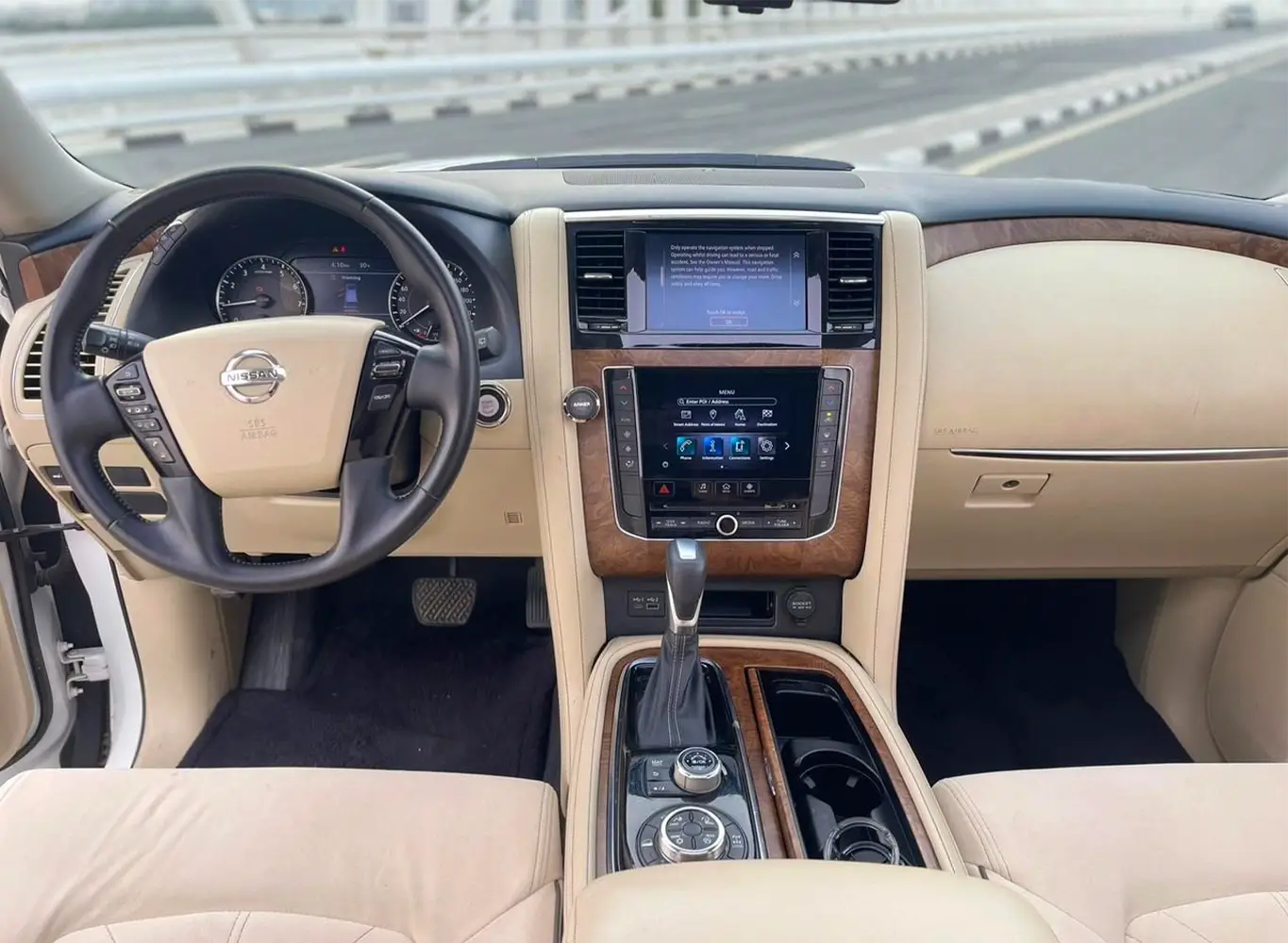 Hire 2025 Nissan Patrol Platinum White in Dubai photo 3