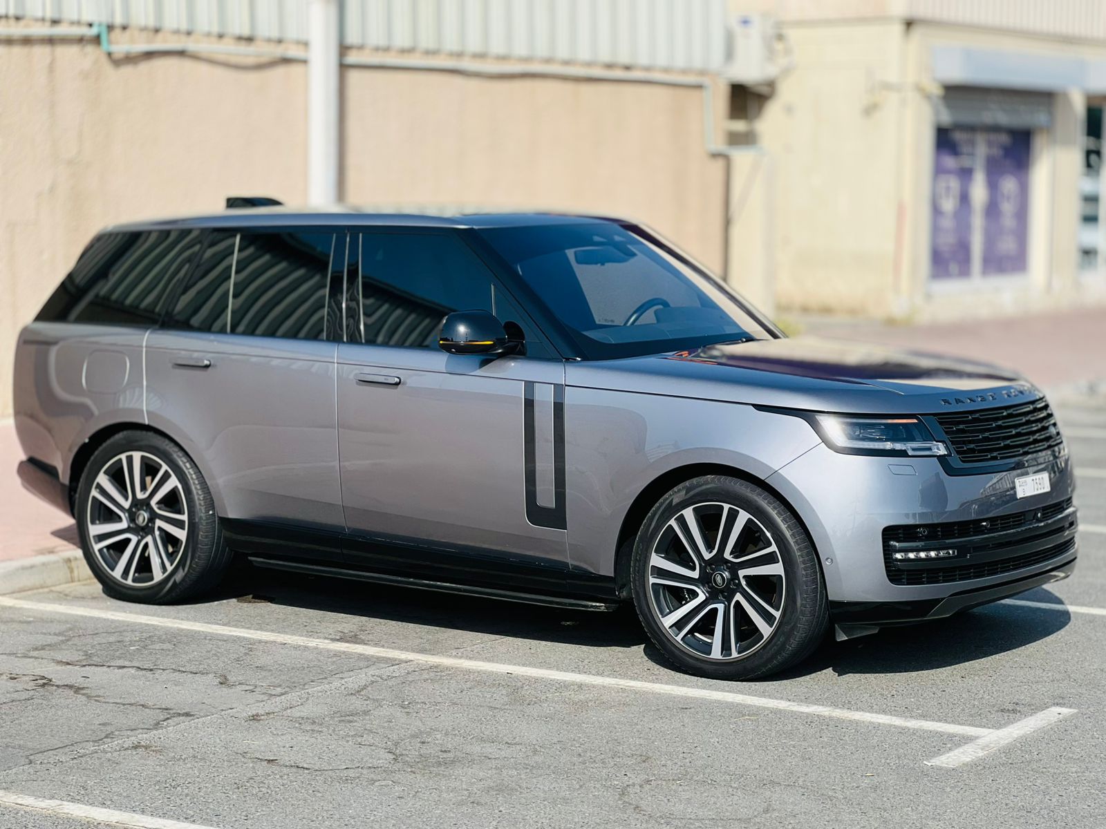 Rent a 2023 Land Rover Range Rover Vogue Grey in Dubai rental in Sheikh Zayed Road, Dubai
