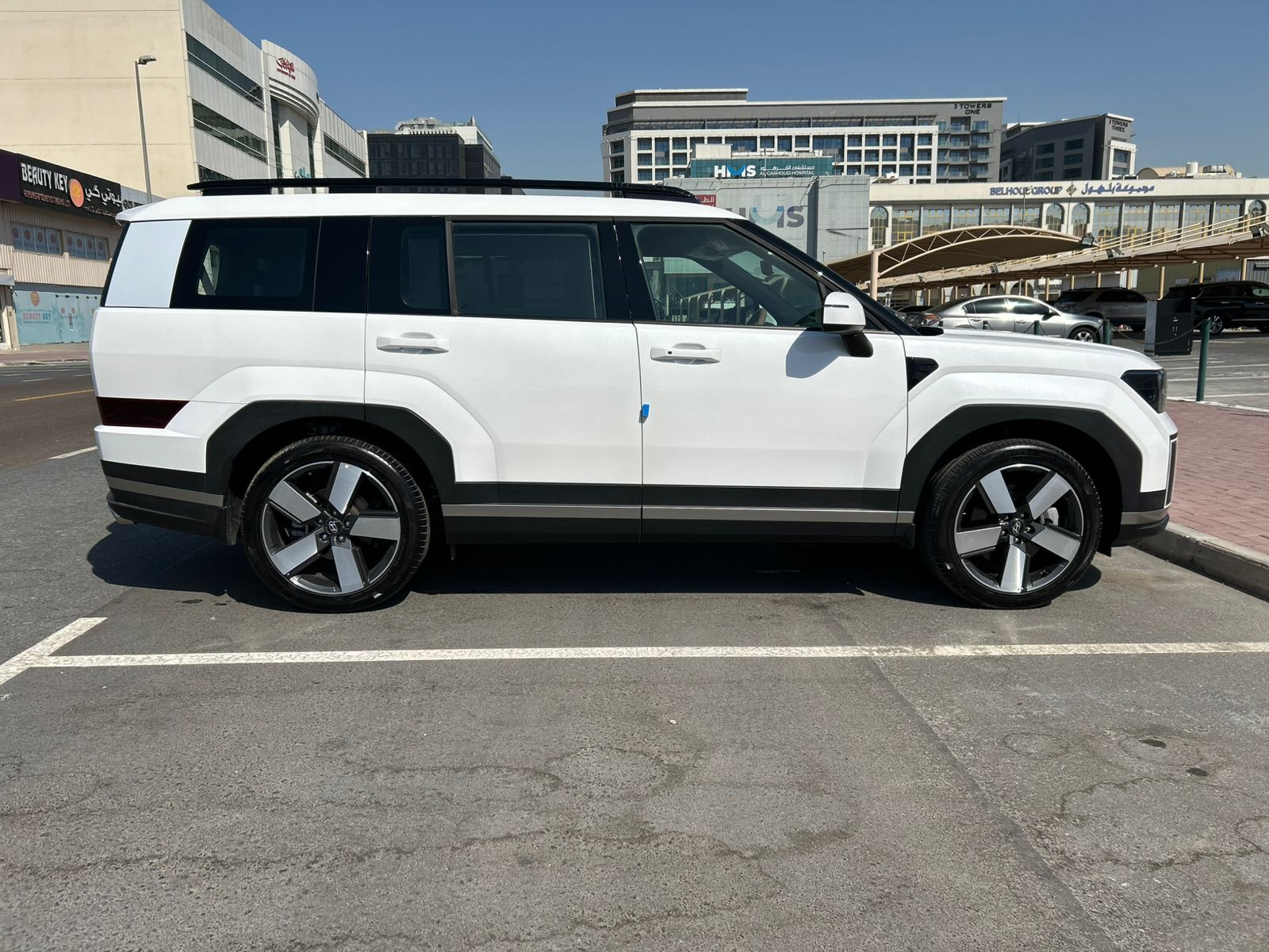 Hire 2025 Hyundai Santa Fe White in Dubai photo 2