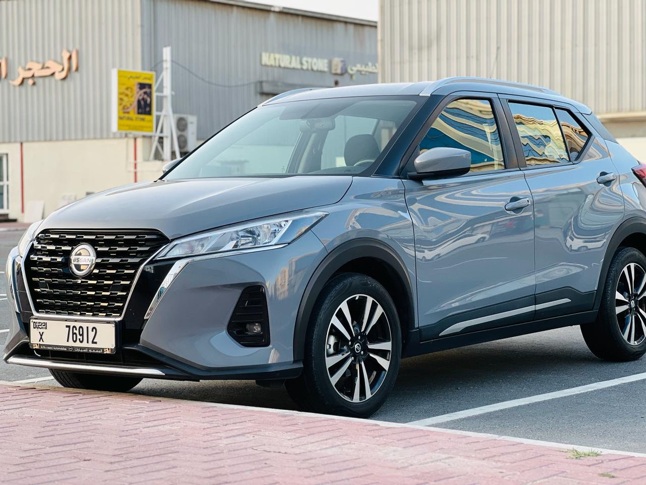 Rent 2022 Nissan Kicks Grey in Dubai photo 2