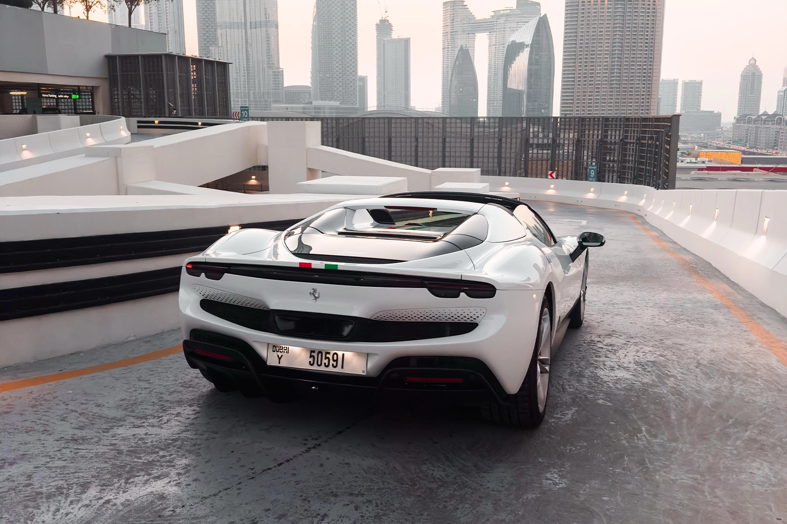 Rent Ferrari 296 GTS White in Dubai photo 2