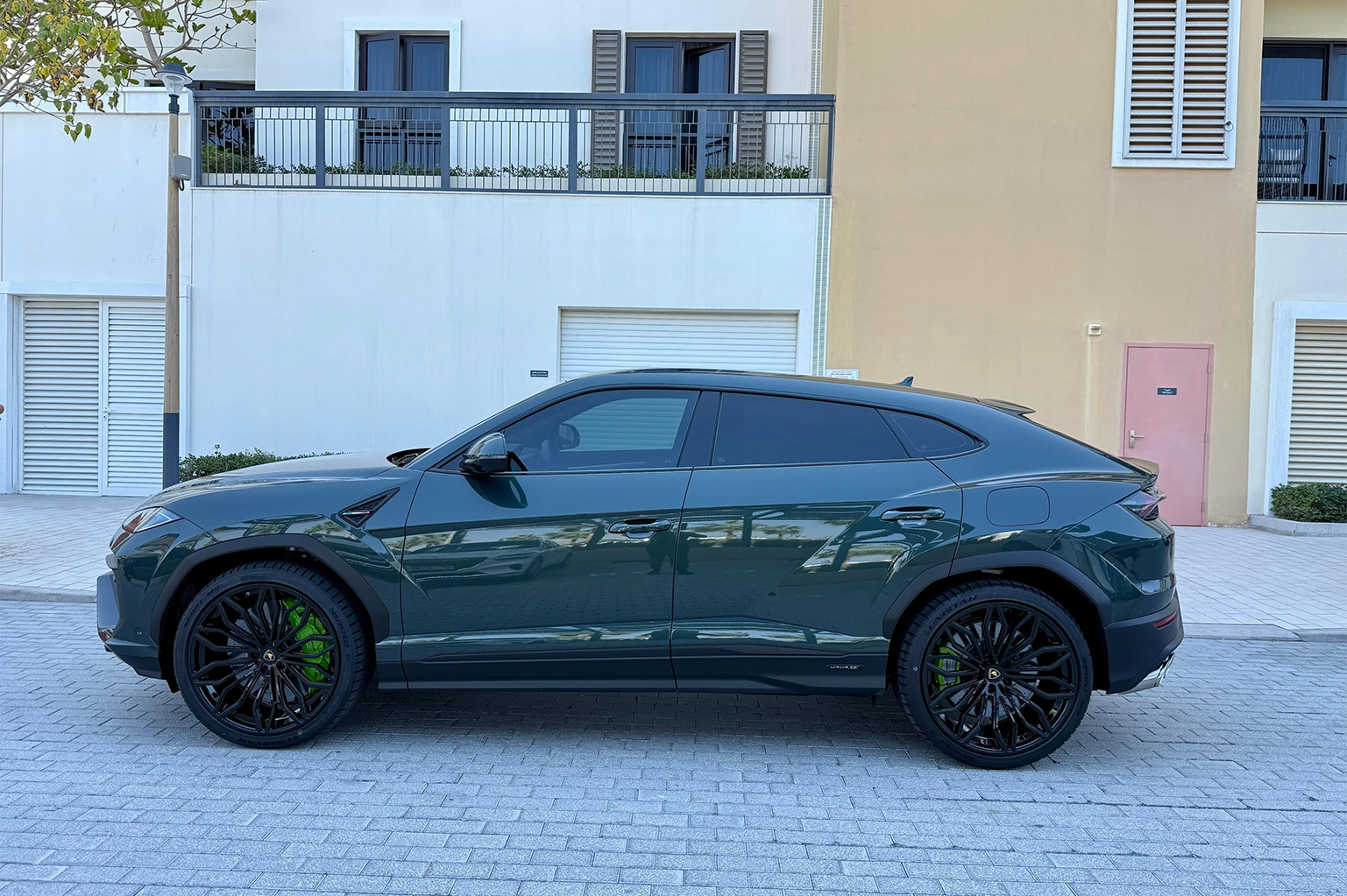 Rent a Lamborghini Urus SE Dark Green in Dubai photo 2
