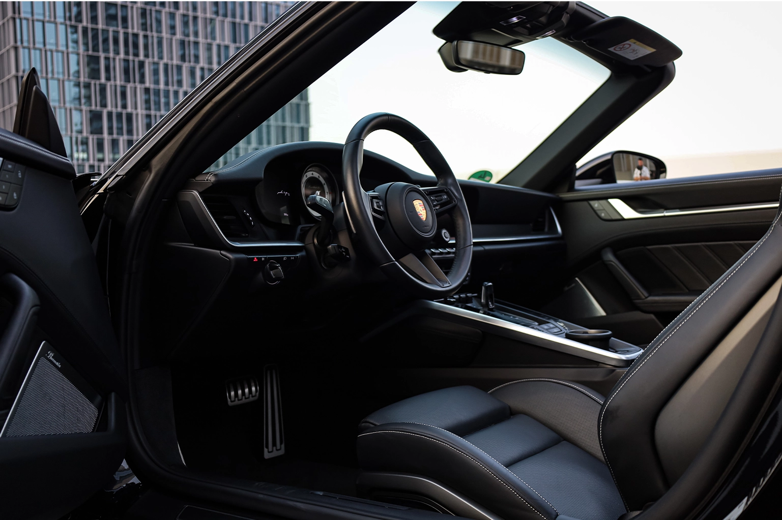 Rent a Porsche 911 Turbo S Black in Dubai photo 4