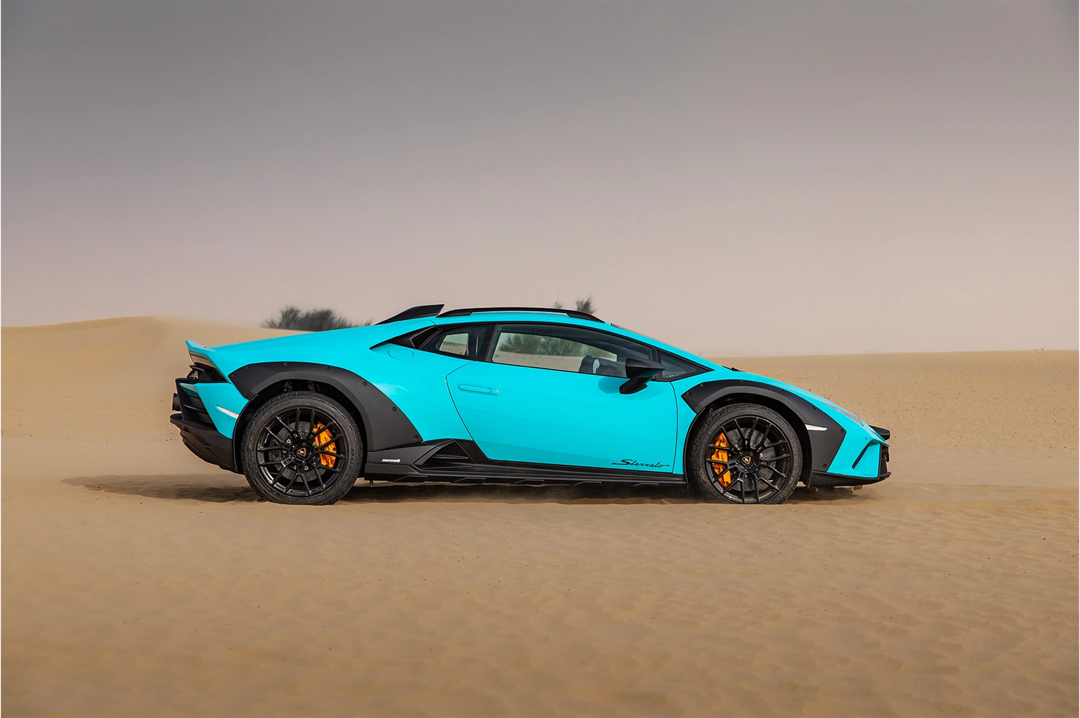 Hire Lamborghini Huracan Sterrato Blue in Dubai photo 3