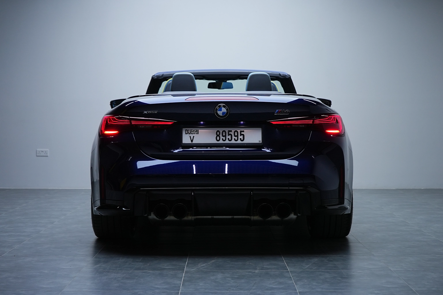 Rent a BMW M4 Competition Navy Blue in Dubai photo 2