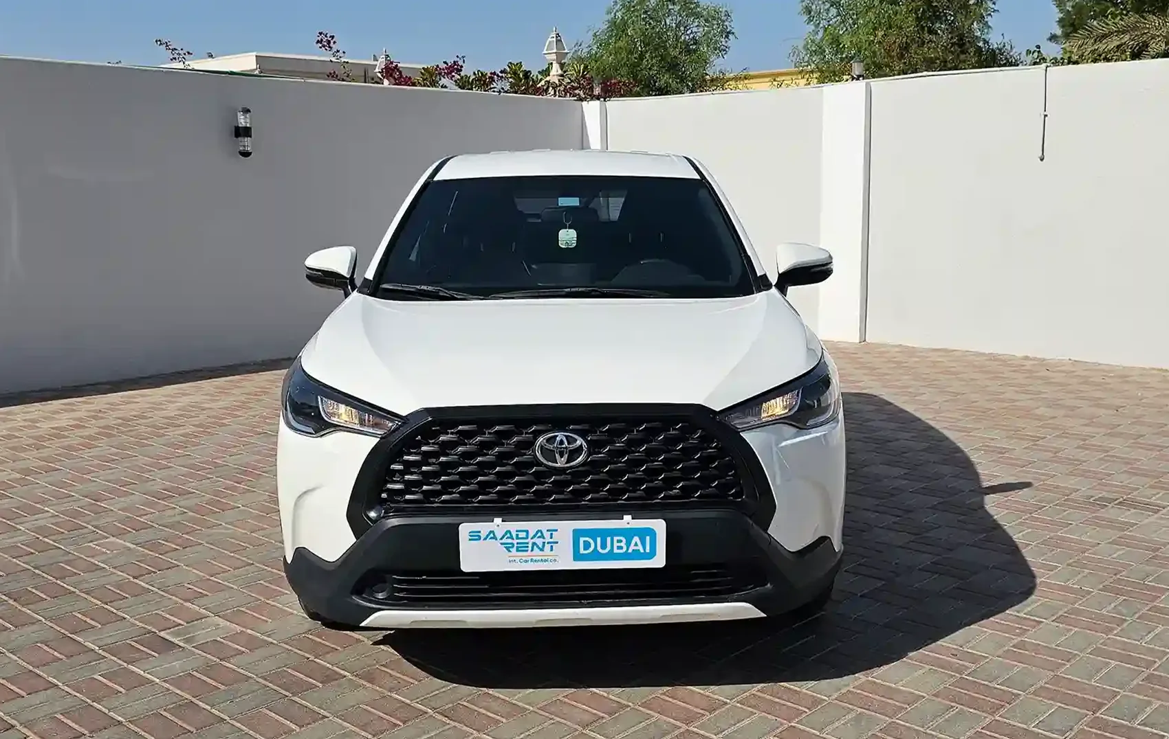 Rent 2023 Toyota Corolla Cross White in Dubai photo 2