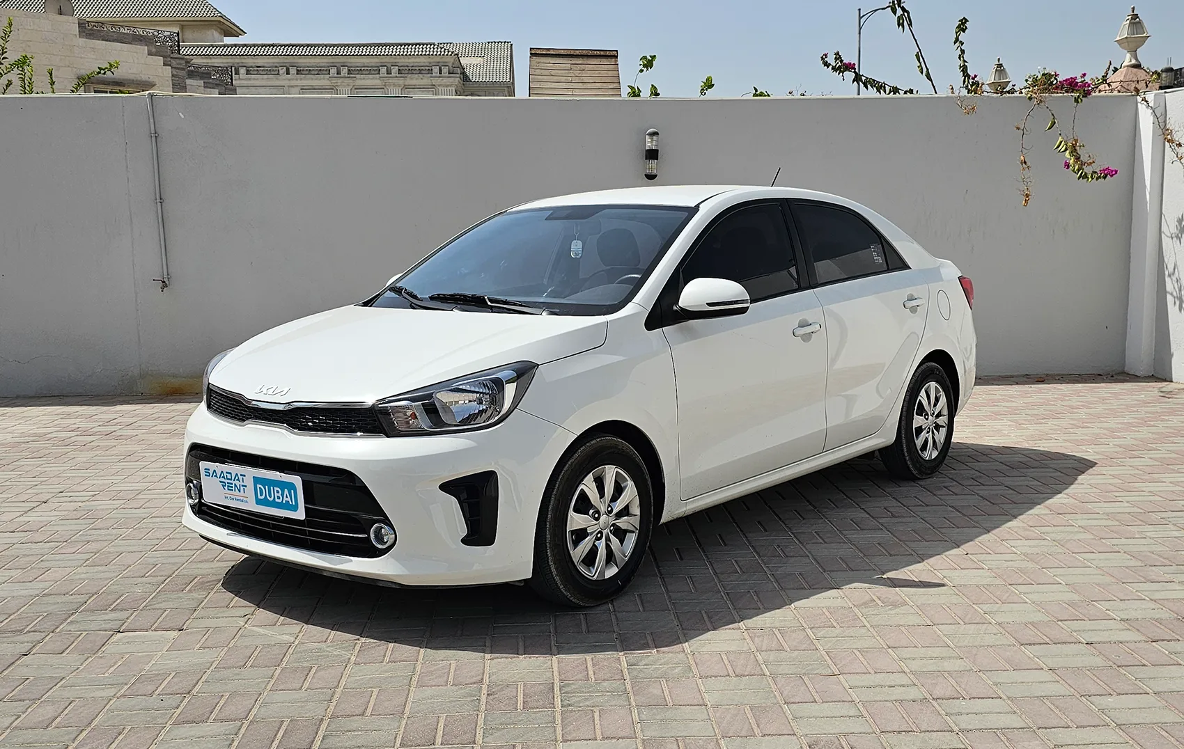 2025 Kia Pegas White Rental in Dubai photo 2