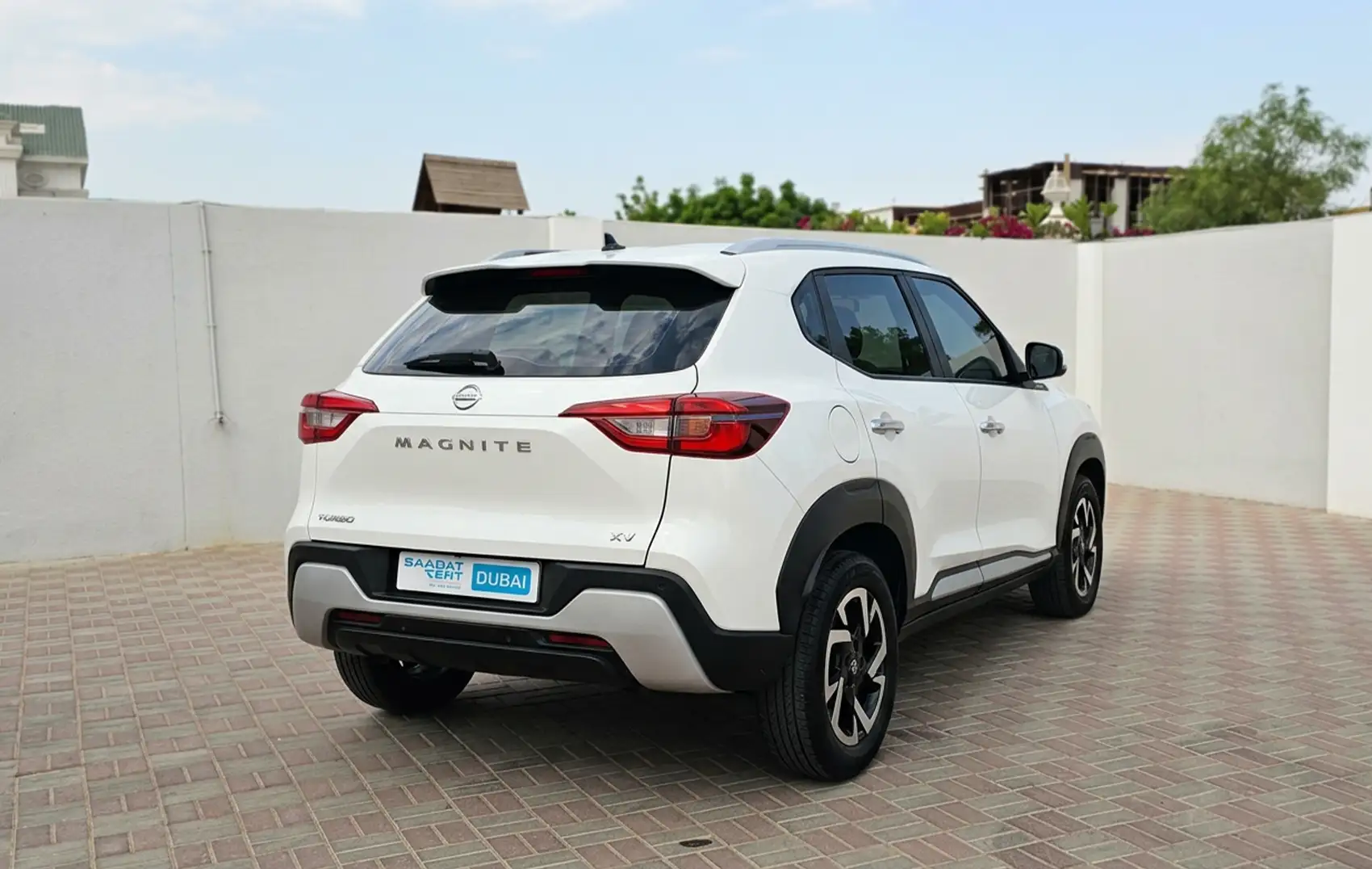 Rent a 2026 Nissan Magnite White in Dubai photo 2