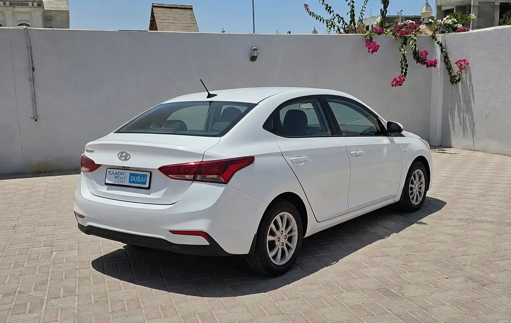 Rent 2024 Hyundai Accent White in Dubai photo 2