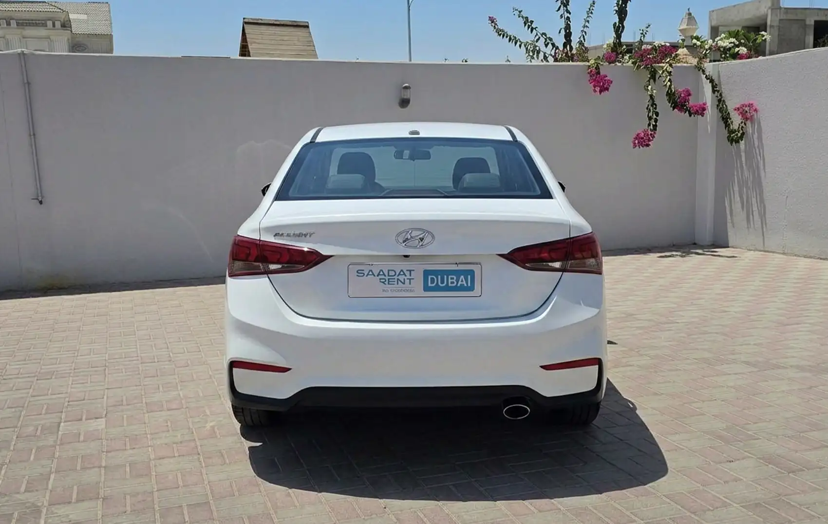 Rent 2024 Hyundai Accent White in Dubai photo 3