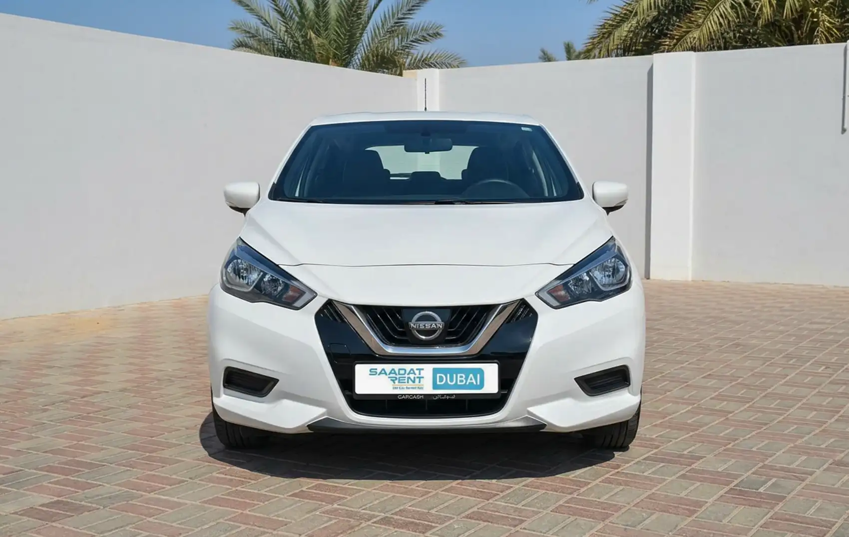 Rent a 2023 Nissan Micra White in Dubai photo 2