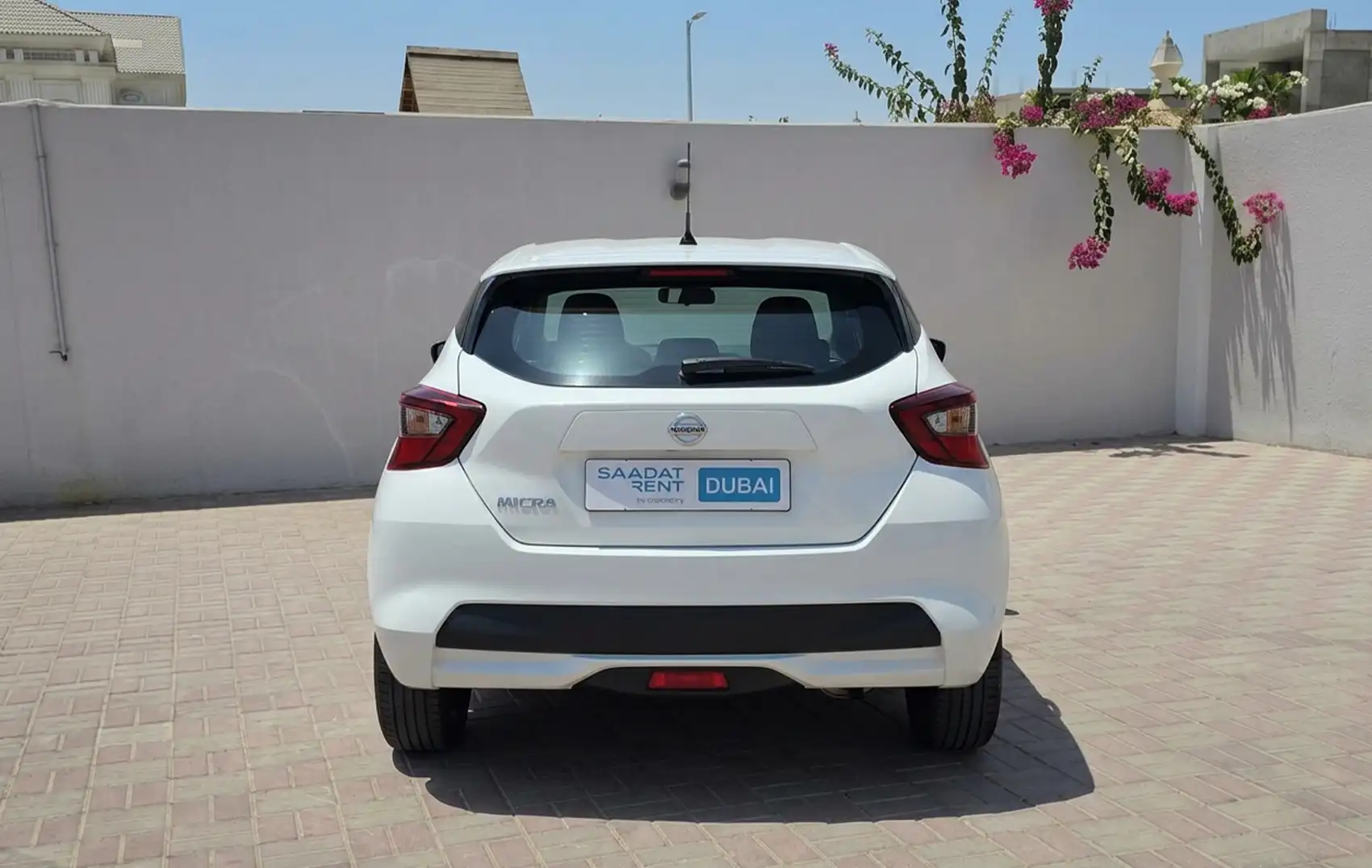 Rent a 2023 Nissan Micra White in Dubai photo 3