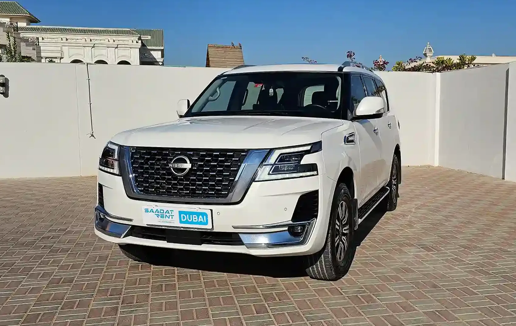 Rent 2023 Nissan Patrol White in Sharjah