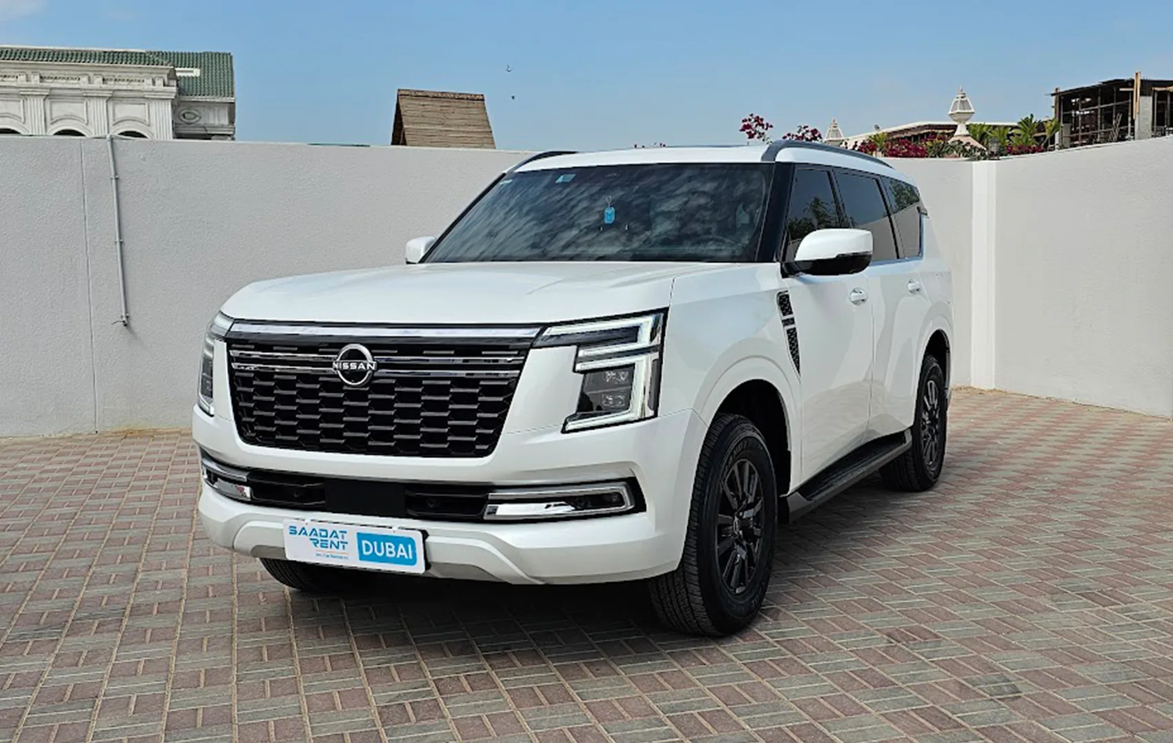 Rent 2025 Nissan Patrol SE White in Abu Dhabi photo 2
