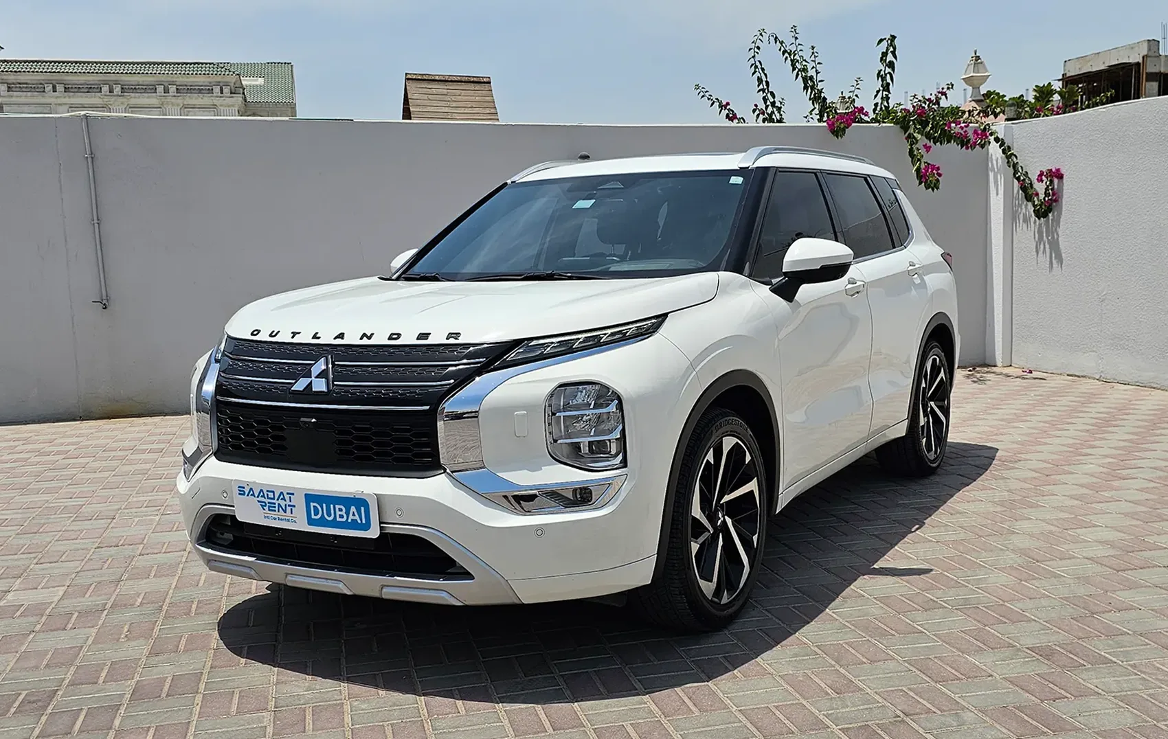 Rent a 2024 Mitsubishi Outlander White in Ajman photo 2