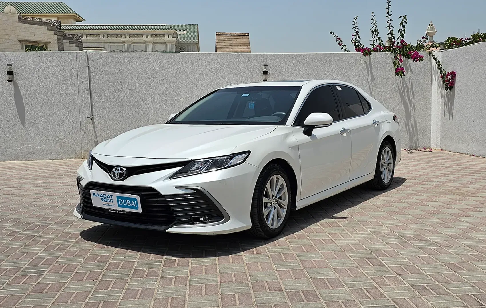 Rent a 2024 Toyota Camry LE White in Abu Dhabi