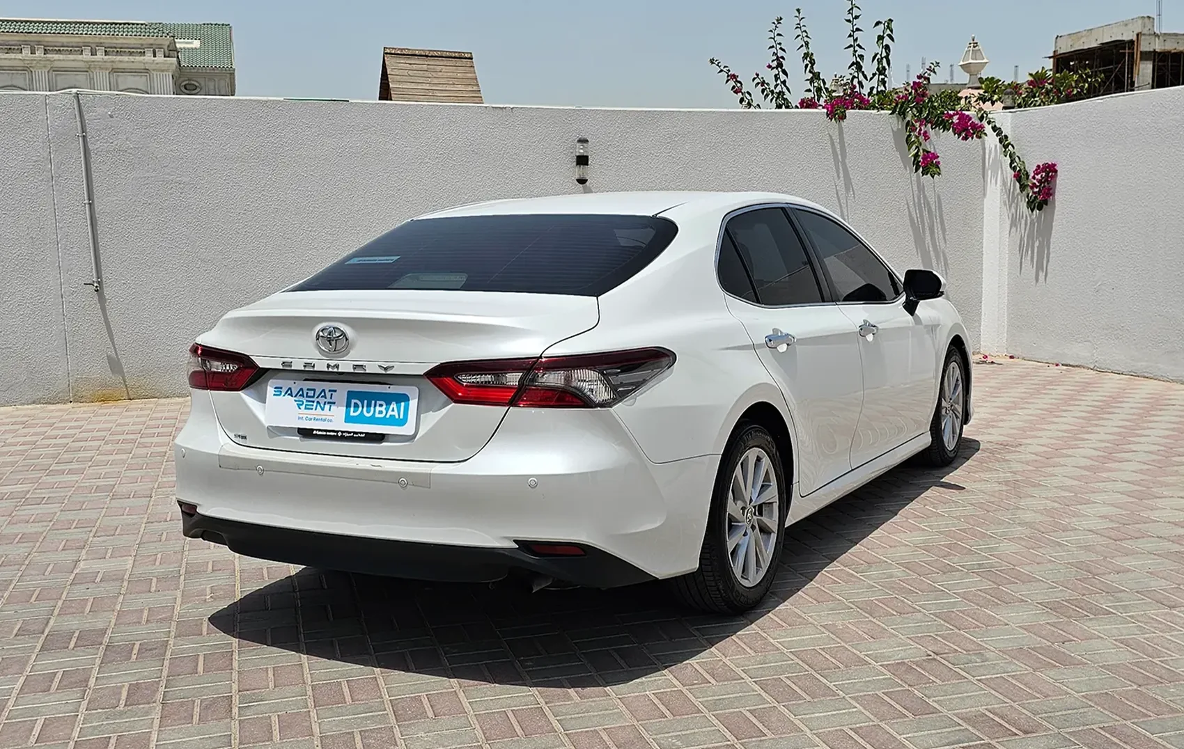 Rent a 2024 Toyota Camry LE White in Ajman photo 2