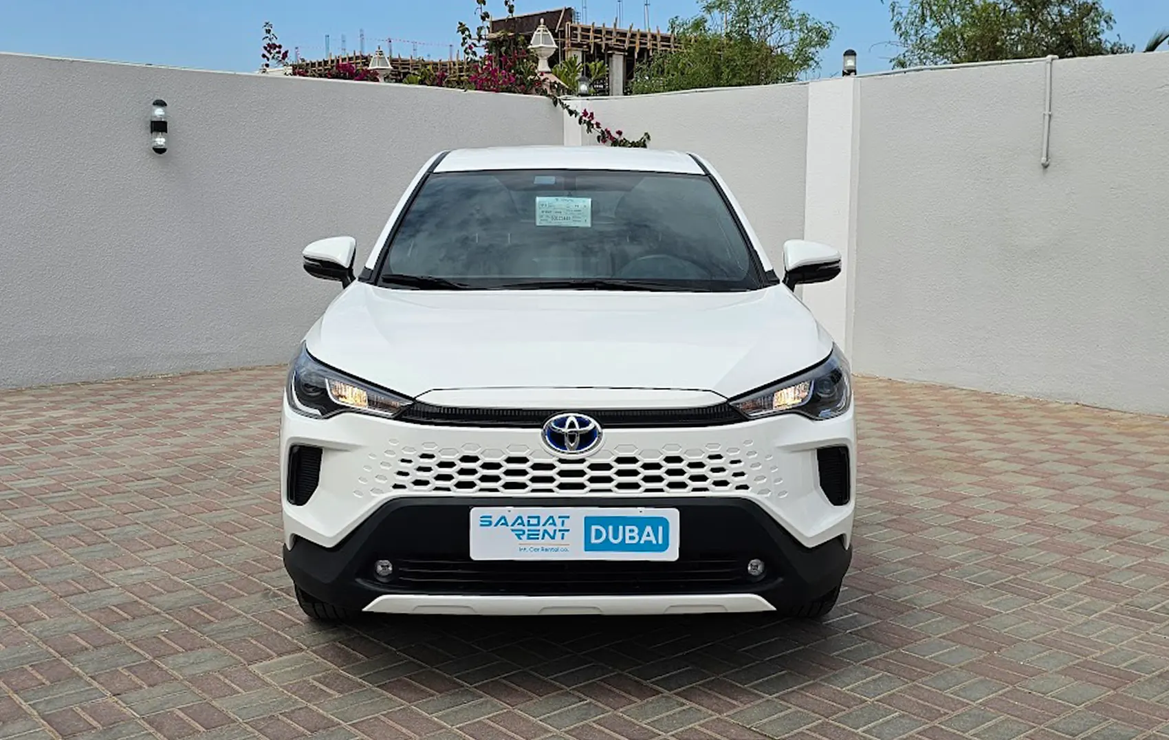 Rent a 2025 Toyota Corolla Cross GLI White in Abu Dhabi