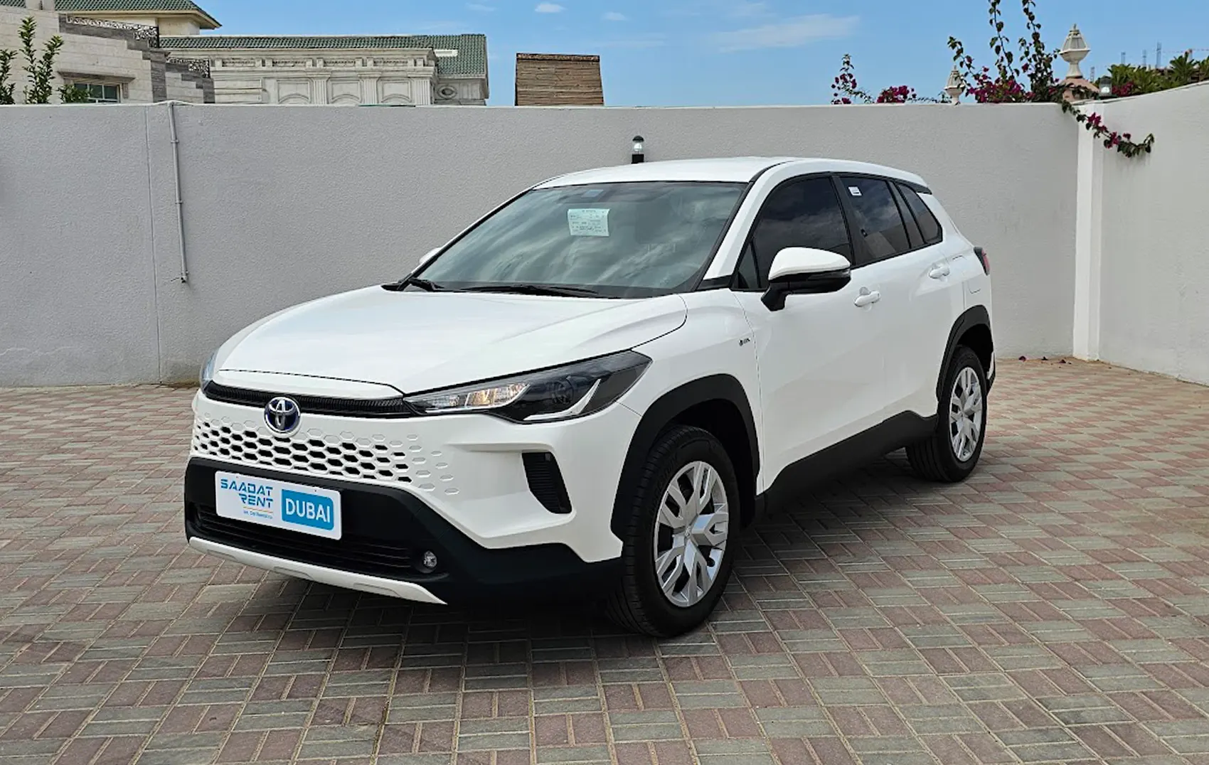 Rent a 2025 Toyota Corolla Cross GLI White in Abu Dhabi photo 2