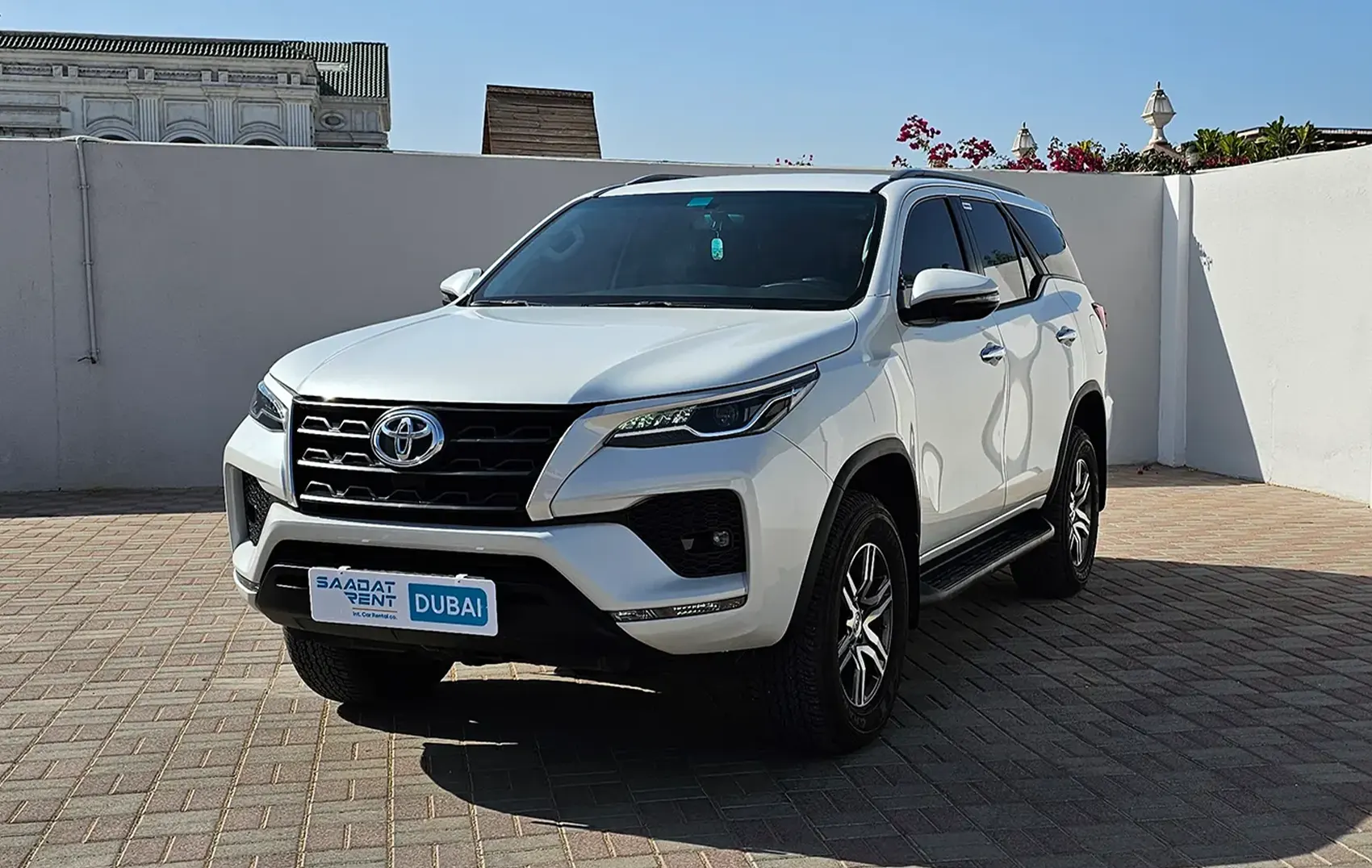 Hire 2025 Toyota Fortuner White in Sharjah