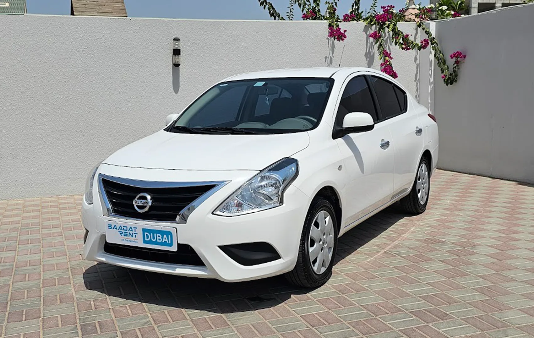 2024 Nissan Sunny White Rental in Abu Dhabi photo 2