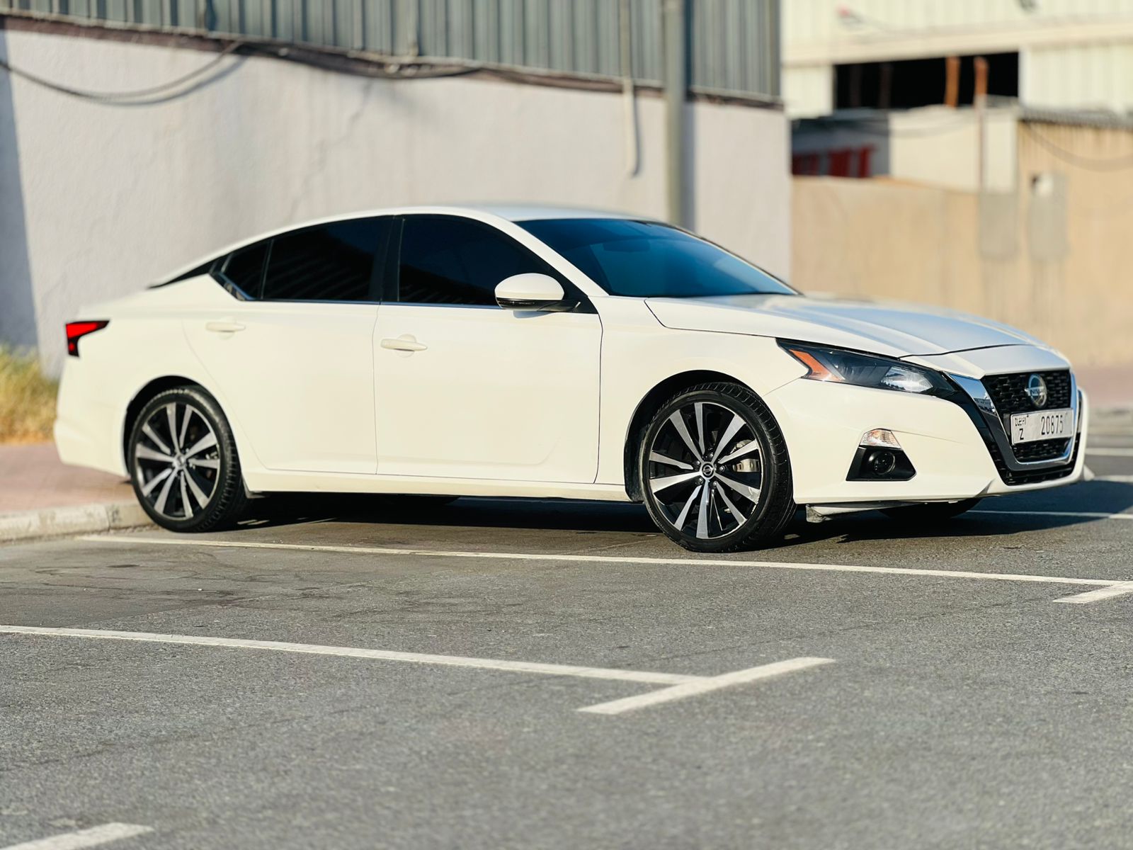 Hire 2023 Nissan Altima White in Dubai rental in Sheikh Zayed Road, Dubai