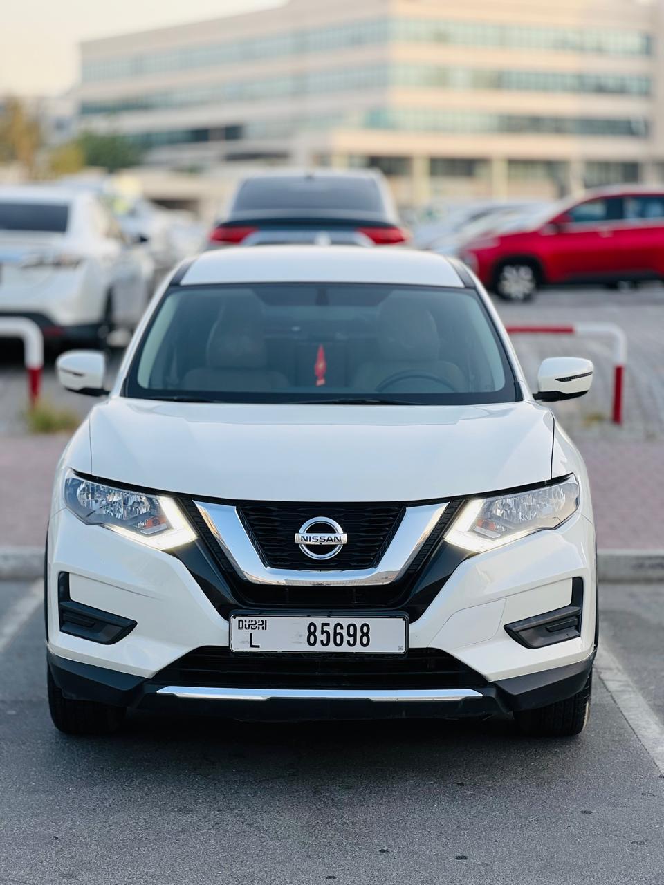 Rent a 2021 Nissan X-Trail White in Dubai photo 2