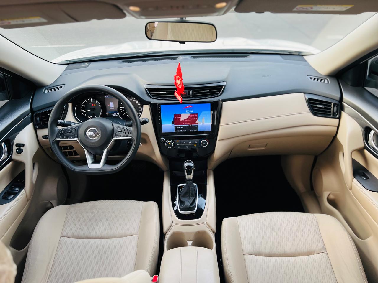Rent a 2021 Nissan X-Trail White in Dubai photo 3