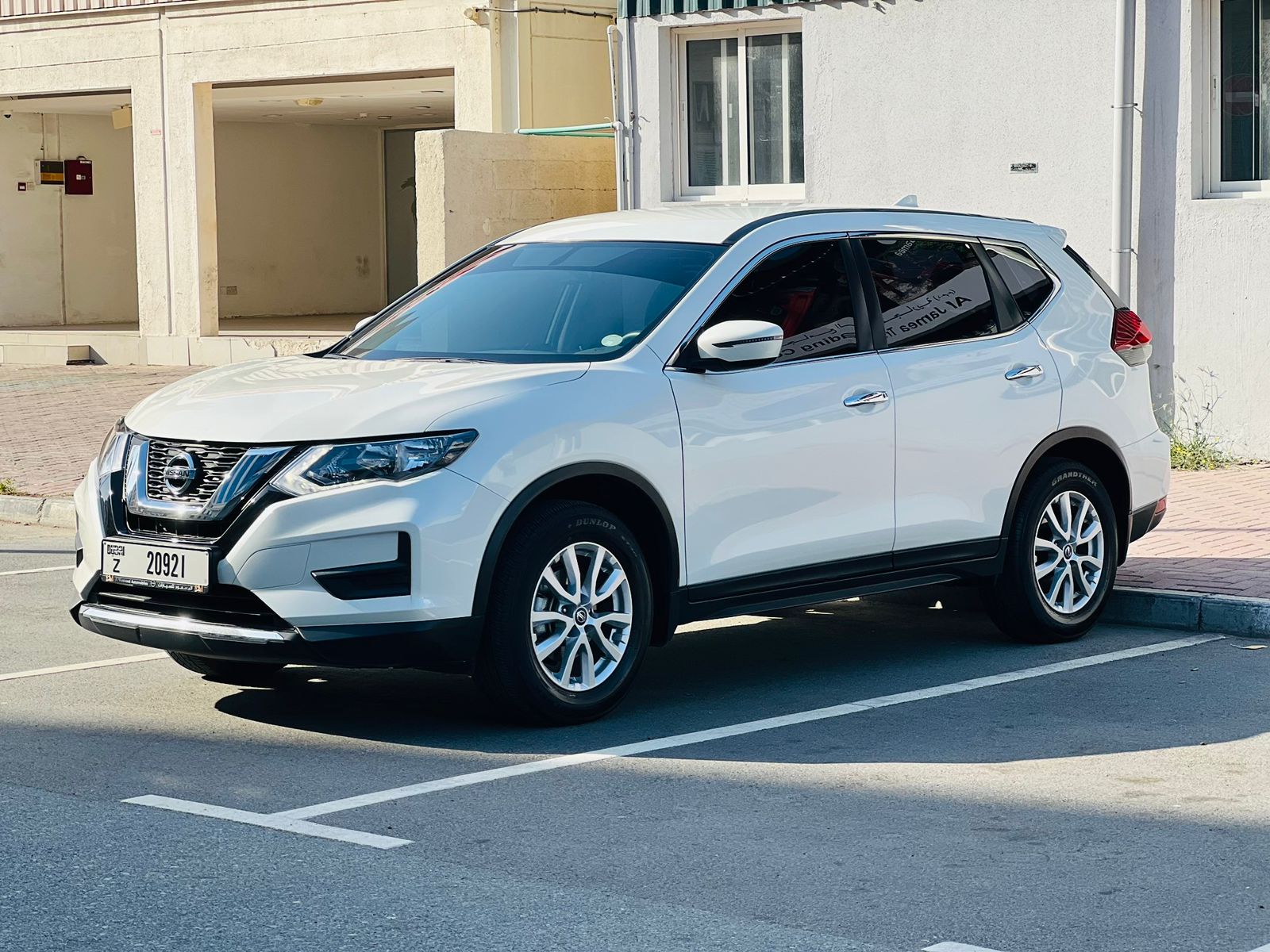 Rent a 2023 Nissan X-Trail White in Dubai rental in Sheikh Zayed Road, Dubai