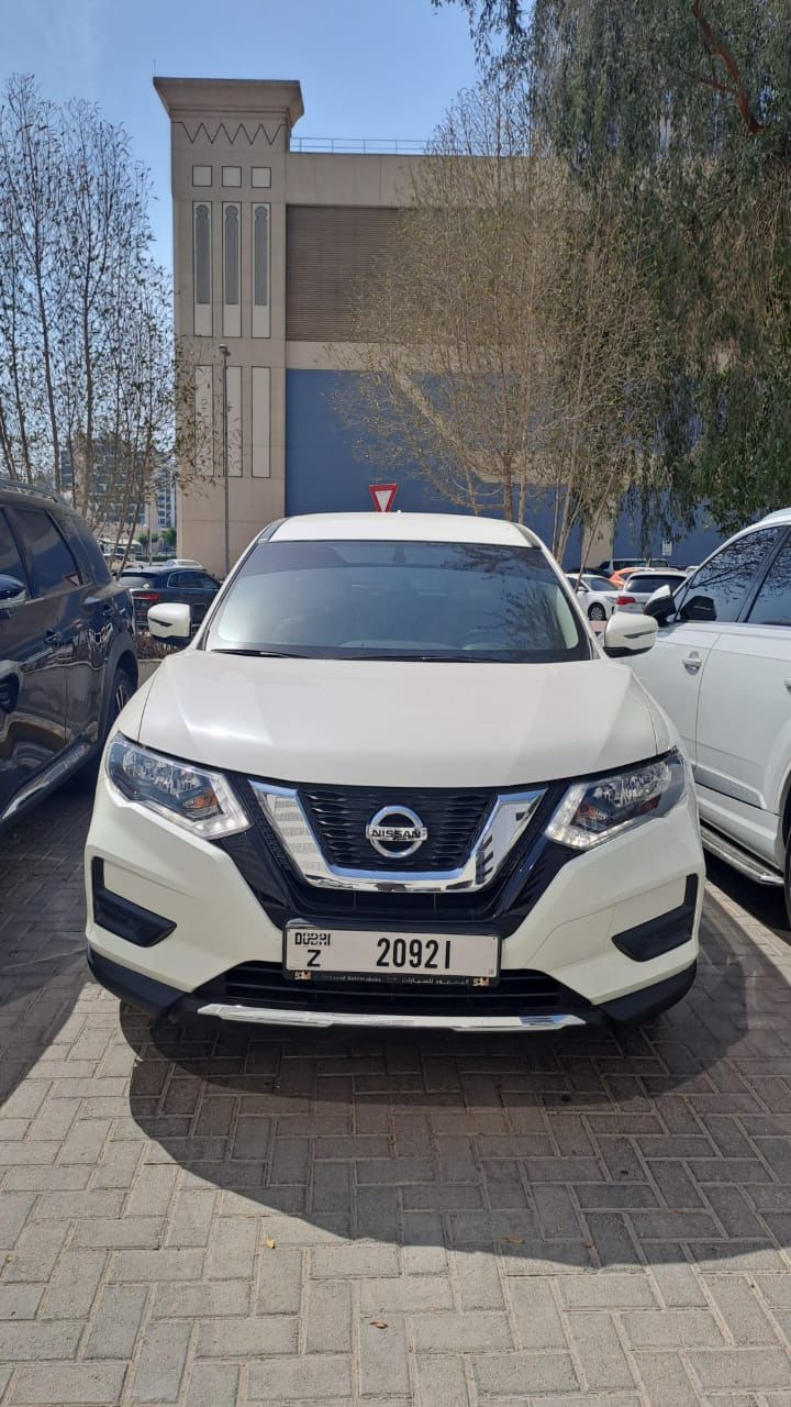 Rent a 2023 Nissan X-Trail White in Dubai photo 2