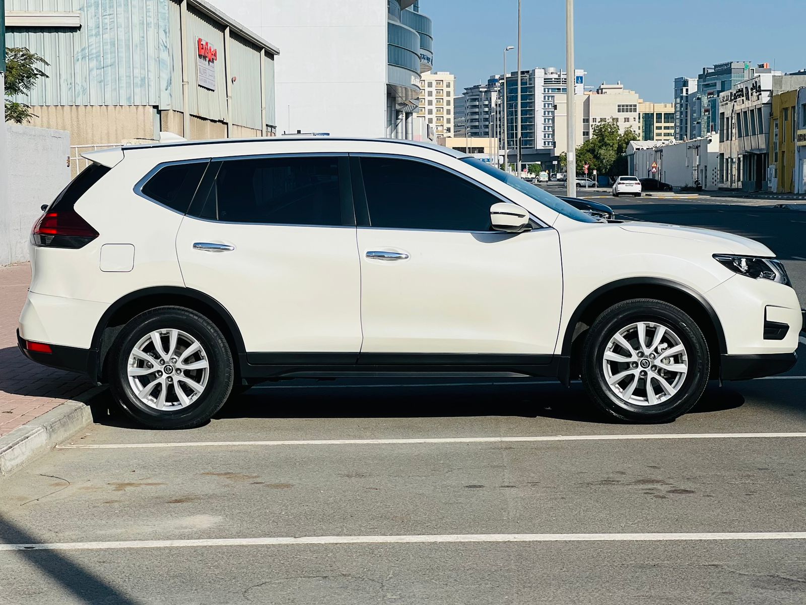 Rent a 2023 Nissan X-Trail White in Dubai photo 3