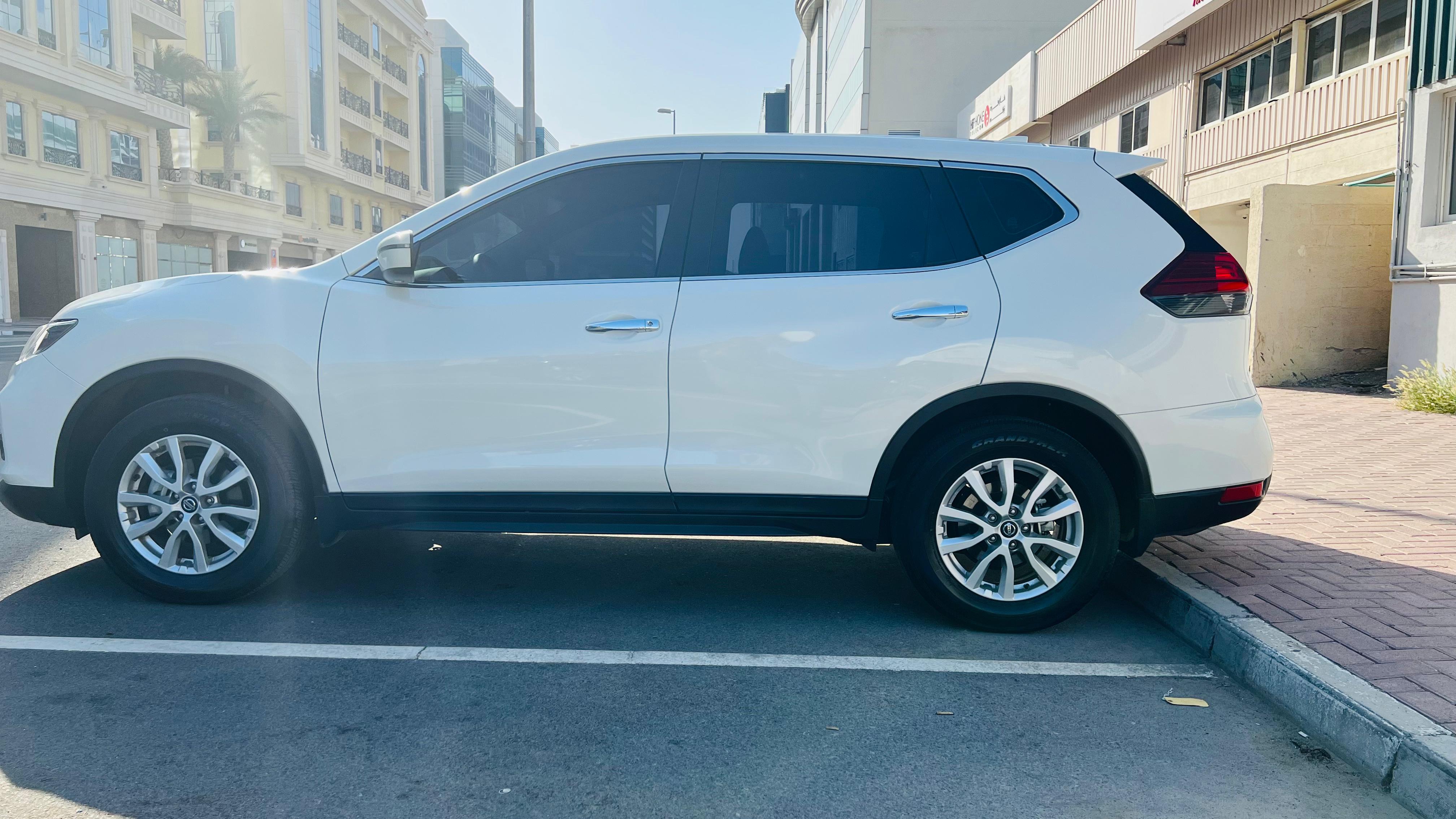 Rent a 2023 Nissan X-Trail White in Dubai photo 4
