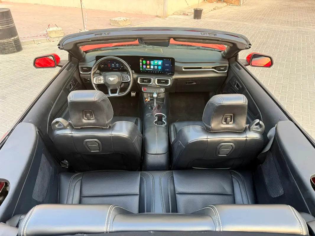 Rent a 2024 Ford Mustang in Al Quoz 4 (Red) photo 3